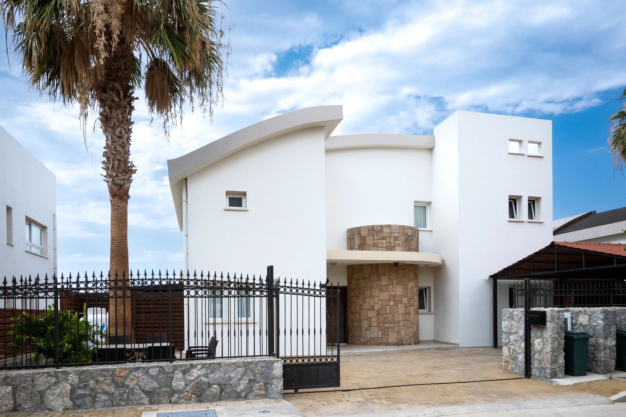 Luxury villa exterior in tropical setting